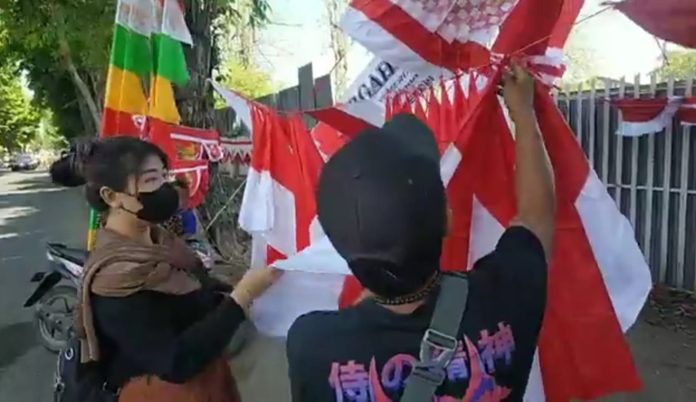 Sempat Terpuruk karena Pandemi, Omzet Pedagang Bendera Kini Naik 100 Persen