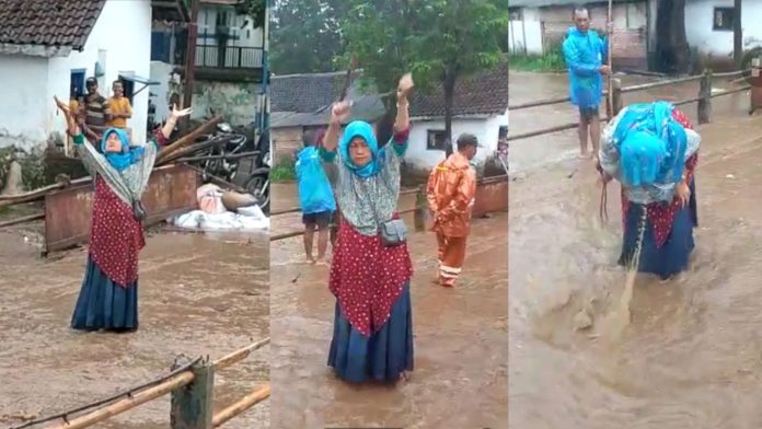 Viral Aksi “Pawang” di Tengah Banjir Pasuruan