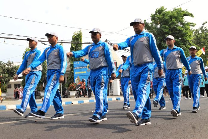 Lomba Gerak Jalan Warnai Peringatan HUT PGRI Ke-78 dan HGN 2023 di Kota Pasuruan