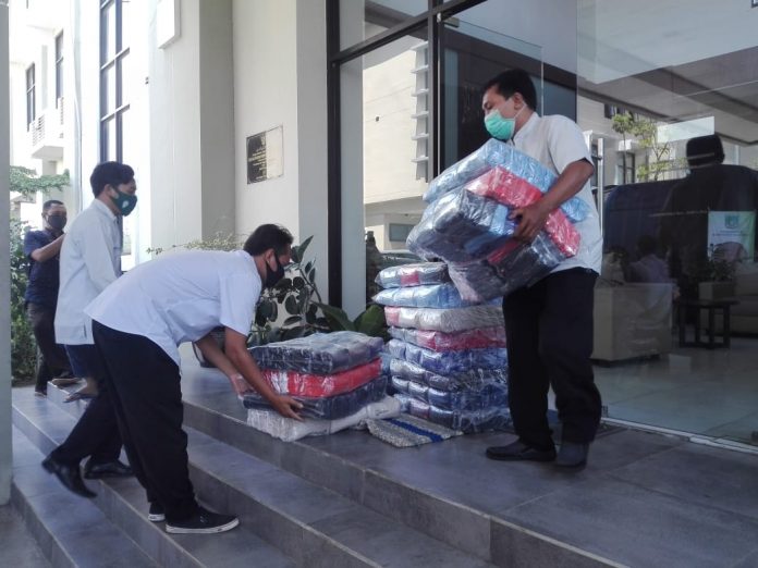 JADI POLEMIK: Ribuan masker di Disperindag-Dinkop yang siap didistribusikan, Rabu (6/05/2020). Foto: Asad Asnawi.